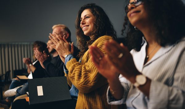 Group of people clapping