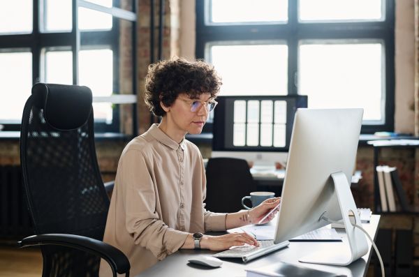 Manager working on computer in office