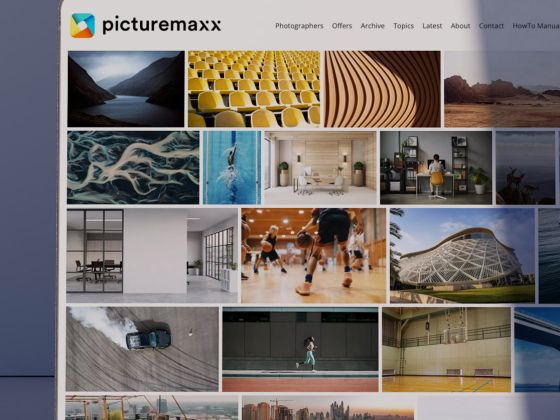 A laptop showcasing a website created with picturemaxx Drupal.